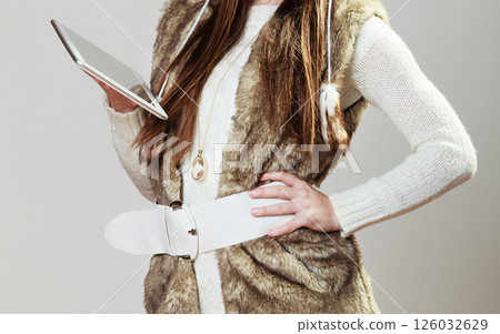 Woman holding tablet computer Woman holding tablet computer 126032629