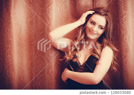 Portrait of happy young woman in lingerie. Portrait of happy young woman in lingerie. 126033080
