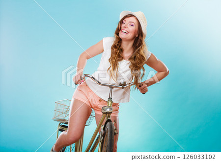 Active woman riding bike bicycle. Recreation. Active woman riding bike bicycle. Recreation. 126033102