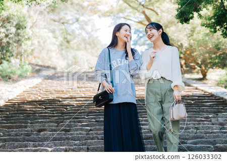 A pair of women sightseeing in Nara A pair of women sightseeing in Nara 126033302