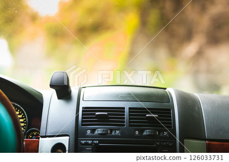 Car driving, view from inside on dashboard Car driving, view from inside on dashboard 126033731