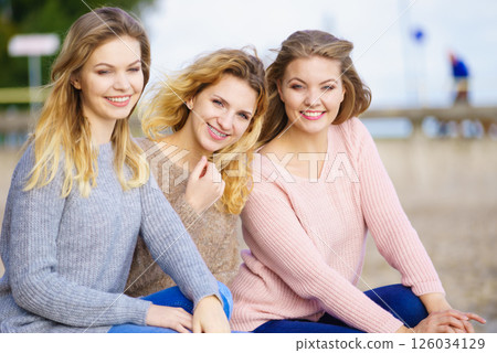 Three fashionable models outdoor 126034129