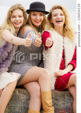 Three fashionable woman outdoor 126034139