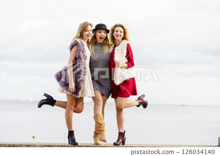 Three fashionable woman outdoor 126034140