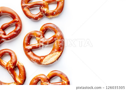 Pretzel or Bretzel, traditional German beer snack, a salty wheat bread Pretzel or Bretzel, traditional German beer snack, a salty wheat bread 126035305