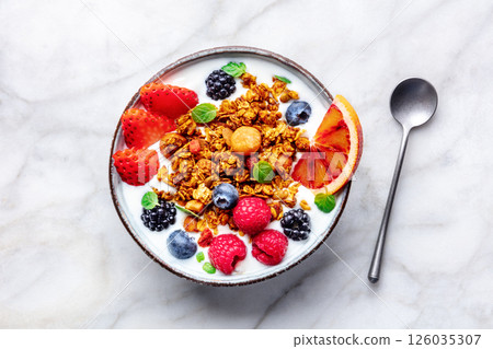 Granola with yogurt and fresh fruit. Organic gourmet muesli 126035307