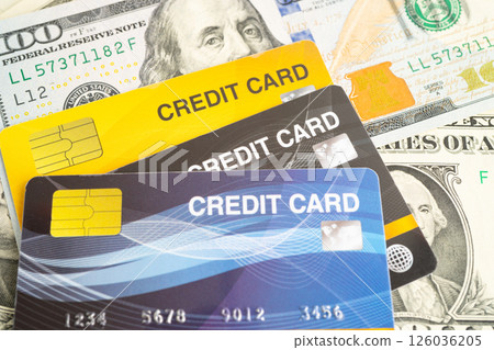 Credit card on US dollar banknotes, finance economy trading shopping online business. Credit card on US dollar banknotes, finance economy trading shopping online business. 126036205