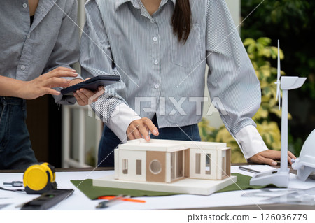 Sustainability and Digital Collaboration. Architects using technology to enhance sustainable building design. Sustainability and Digital Collaboration. Architects using technology to enhance sustainable building design. 126036779