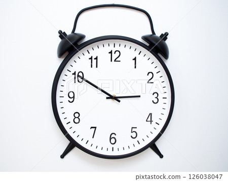 Black Retro Alarm Clock Showing 02:50 or 14:50. Classic Bell Style on White Wood Background. 126038047