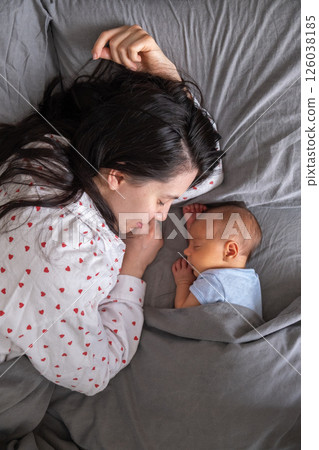 Mother and Baby Sleeping Peacefully Together 126038185