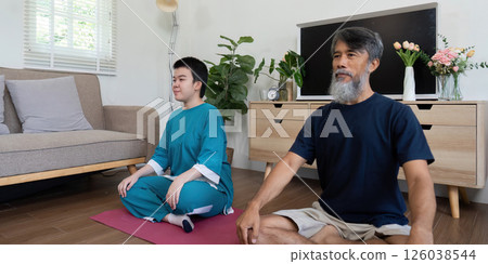 Wellness activities with father and daughter with Down syndrome 126038544