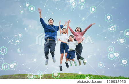 Jumping parent and child and environmental technology concept 126038950