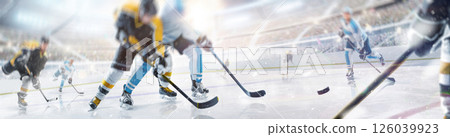 Hockey competitions at an open stadium. Focuses on hockey skates, sticks and puck. Fight for the puck. Concept of sport, healthy lifestyle, Hockey action 126039923