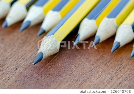 Close up view of pencil standing out representing Leadership with customizable space for text. Close up view of pencil standing out representing Leadership with customizable space for text. 126040708