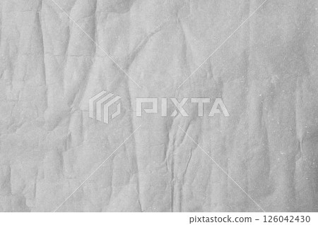 Dark grey crumpled paper material texture Dark grey crumpled paper material texture 126042430