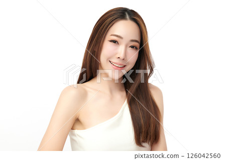 A beautiful young Asian woman with clean, fresh skin against a white background. Skincare, facial treatment, cosmetology, beauty, and spa. An elegant portrait of an Asian woman. A beautiful young Asian woman with clean, fresh skin against a white background. Skincare, facial treatment, cosmetology, beauty, and spa. An elegant portrait of an Asian woman. 126042560