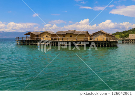 Museum on water, Bay of Bones, prehistoric pile-dwelling, recreation of a bronze age settlement on Lake Ohrid, North Macedonia 126042961