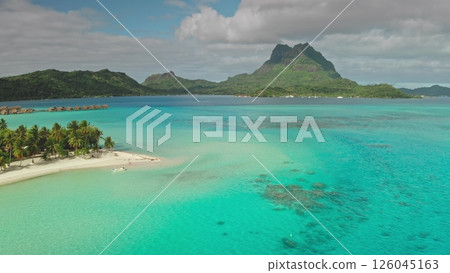 Stunning drone footage revealing Bora Bora's idyllic beauty. Featuring crystal-clear turquoise waters. Vibrant coral reefs. Pristine white sand beaches. Travel tropical vacation concept Stunning drone footage revealing Bora Bora's idyllic beauty. Featuring crystal-clear turquoise waters. Vibrant coral reefs. Pristine white sand beaches. Travel tropical vacation concept 126045163