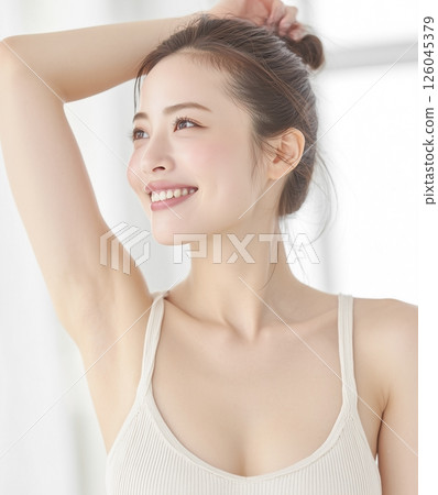 Smiling female model who is conscious of beauty and skin care. Beauty image of hair removal salon 126045379