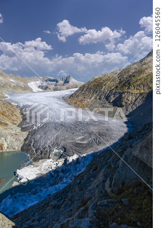 High mountain glacier Rhonegletscher and glacial lake on Furkapass in summer Switzerland 126045560