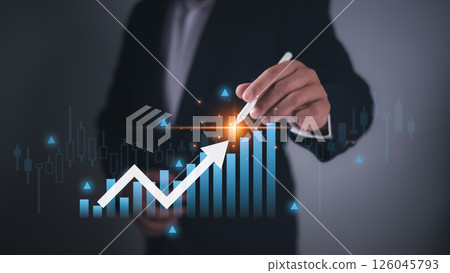 Businessman analyzing stock market chart with growth bar graph and arrow trend, Financial success, investment strategy, Economic forecast and data analytics, Concept of business growth trend. 126045793