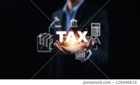 Concept of taxes payment optimisation business finance, Businessman holding taxes button on technology screen,income tax and property, background for business, individuals and corporations such as VAT 126046618