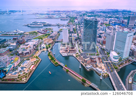 Three luxury cruise ships in the cityscape of Yokohama, Japan. Sakuragicho Station, Riviera, Diamond, Queen Elizabeth, etc. 126046708