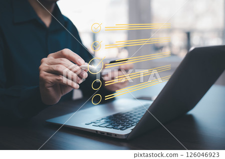 Checklist and clipboard task documentation management Online survey, form checklist by laptop computer, Document Management Checking System, online documentation database and process manage files. 126046923