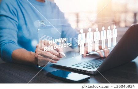 Businessman touch HR Human ,people icon on the graph Screen of a media screen, Technology Process System Business with Recruitment, Hiring, Team Building. Organisation structure concept. Businessman touch HR Human ,people icon on the graph Screen of a media screen, Technology Process System Business with Recruitment, Hiring, Team Building. Organisation structure concept. 126046924