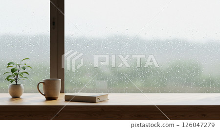 Raindrops on a windowsill and a quiet wooden table 126047279