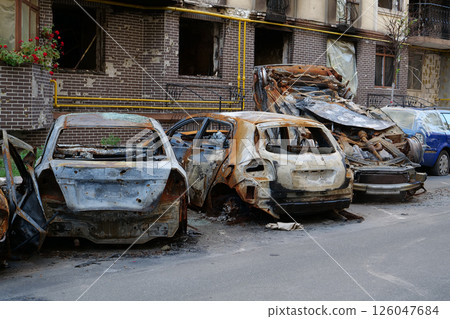 Russian terrorist army burned cars, houses and killed people in Irpin, Ukraine 126047684