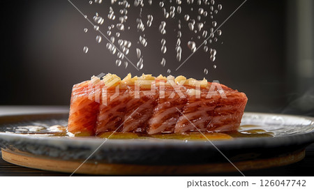 Sashimi with Black Truffle: Floating Slices, Drizzling Truffle Soy Sauce, and Whimsical Sushi Rice 126047742