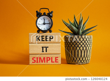 Keep it real symbol. Concept word Keep it real on wooden blocks. Beautiful orange background with succulent plant and alarm clock. Business and Keep it real concept. Copy space 126048124