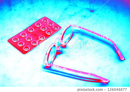 The glasses are next to the package of foil capsules. The concept of healthcare and medicine, 126048877