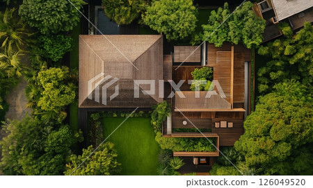Elegant modern wooden house surrounded by lush greenery 126049520