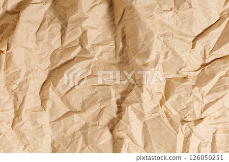 Brown texture kraft paper, recycled cardstock. Old crumpled recycled paper of old crumpled recycled paper Brown texture kraft paper, recycled cardstock. Old crumpled recycled paper of old crumpled recycled paper 126050251