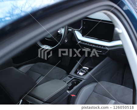 View From Opened Rear Door On A Front Seats Trimmed With Alcantara And Black Leather In Premium Class Car Interior View From Opened Rear Door On A Front Seats Trimmed With Alcantara And Black Leather In Premium Class Car Interior 126050518