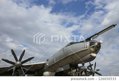 Huge Antenna On Landed Soviet Strategic Bomber Nose With Clouds On Blue Sky Background Huge Antenna On Landed Soviet Strategic Bomber Nose With Clouds On Blue Sky Background 126050533