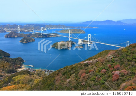 [Ehime Prefecture] The Kurushima Kaikyo Bridge (Shimanami Kaido) as seen from Kiroyama Observatory in spring when cherry blossoms are in bloom 126050713