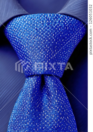 Elegant Blue Tie Showcasing a Modern Texture and Shine Suitable for Formal Occasions or Professional Attire 126051032