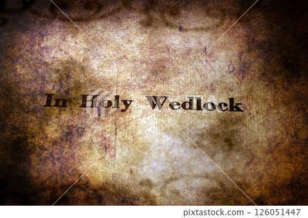 Holy wedlock text on grunge background Holy wedlock text on grunge background 126051447