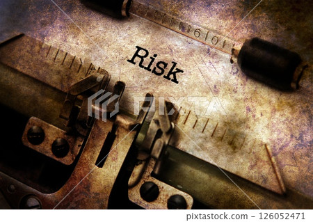 Risk text on typewriter grunge concept Risk text on typewriter grunge concept 126052471