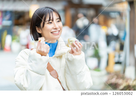 Woman eating out and sightseeing Woman sightseeing Woman eating out and sightseeing Woman sightseeing 126053002