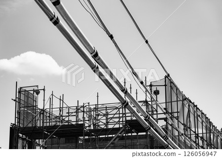 Railway viaduct construction Scaffolding and electric wire protection pipe Tokyo Higashimurayama Station area 2025.04 e-5 monochrome 126056947