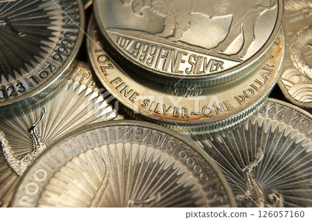 Pure silver investment coins 1oz 999. Close-up background Pure silver investment coins 1oz 999. Close-up background 126057160