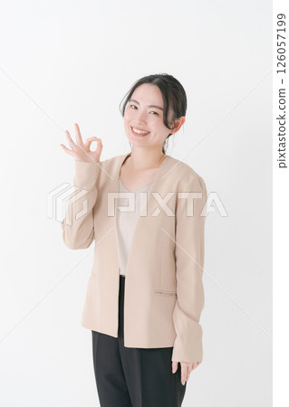 A woman in her 20s in a suit 126057199