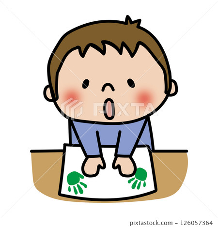 一個孩子（男孩 1）在紙上按手印 126057364