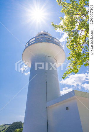 "Iwate Prefecture" The white Kurosaki Lighthouse stands out against the fresh greenery and blue sky, Iwate Prefecture 126057502