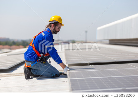 Engineer set installation and inspection standards of solar panels on roof of an industrial factory. Team technician inspection solar cell. Alternative innovation power environmental. 126058200
