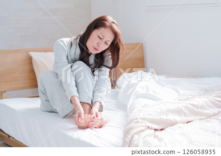 senior woman who is sensitive to cold senior woman who is sensitive to cold 126058935